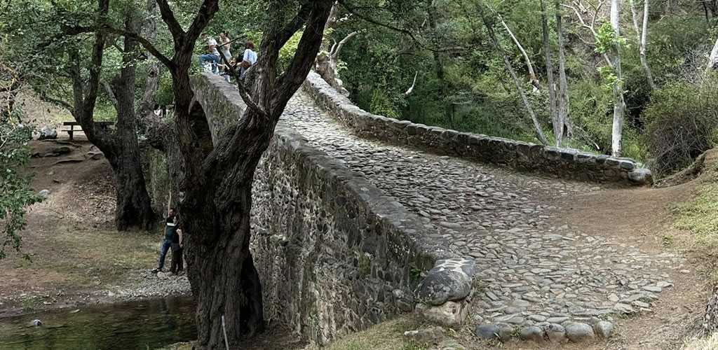 Stone pathway and top view of Tzelefos Bridge